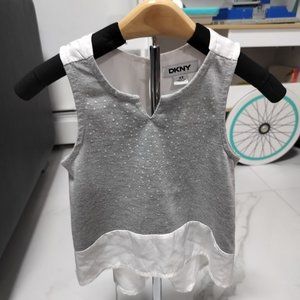 Selling a used DKNY girls shirt Size 2T